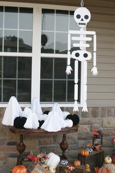 Skeleton, ghost, and pumpkin halloween decorations