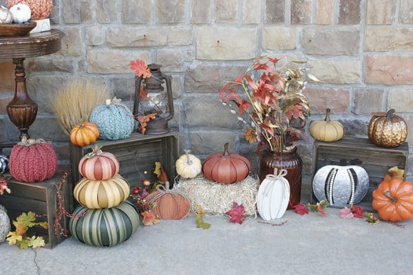 Pumpkin decorations on a fall porch