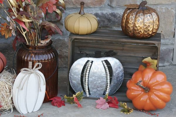 Pumpkin decorations on a fall porch