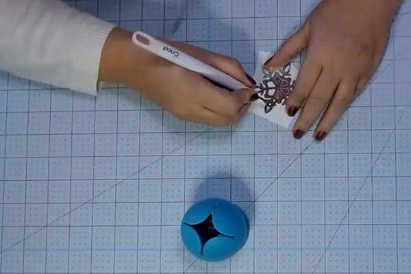 Weeding a vinyl snowflake - alifeofbalance.com