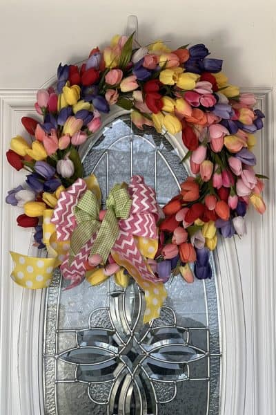 Spring tulip wreath on front door