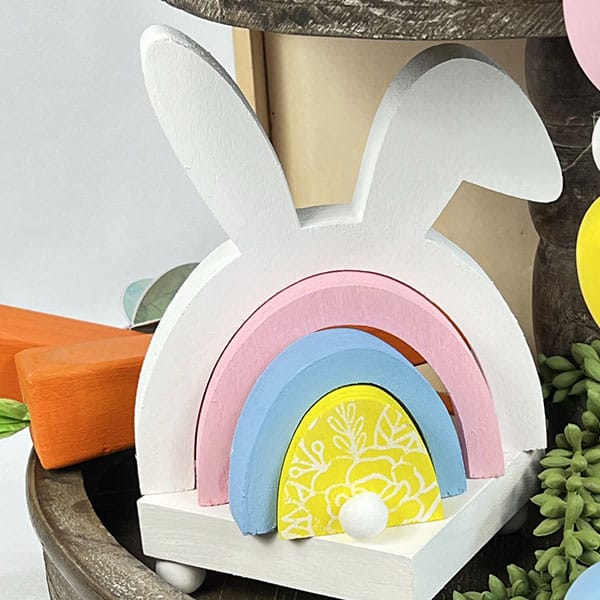 Wooden bunny pieces sculpture on Easter tiered tray.