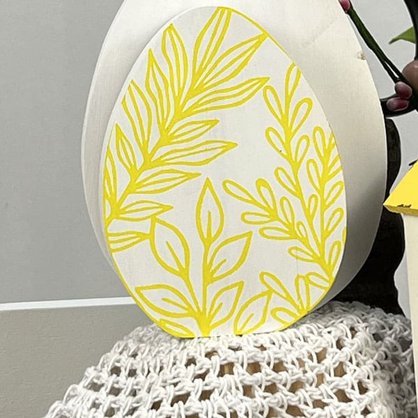 Stenciled Easter egg on Easter tiered tray
