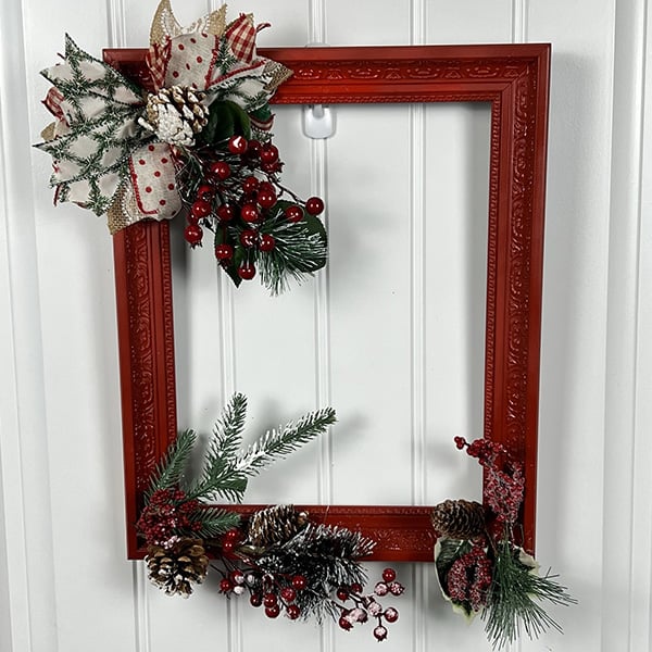 picture frame wreath with greanary and a faux bow