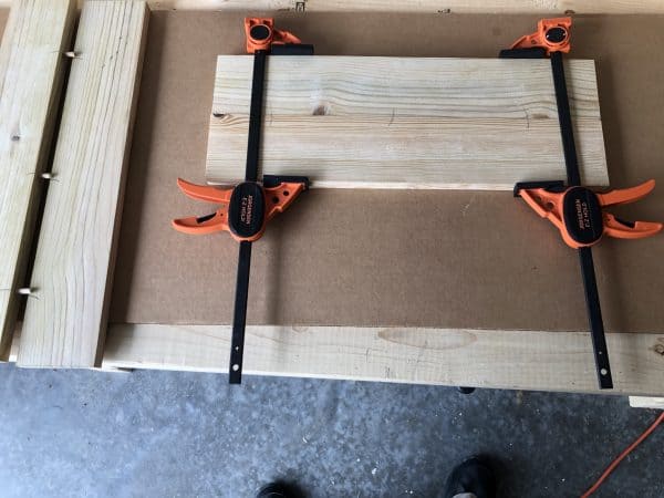 Wood in clamps for doors of grill tools organizer