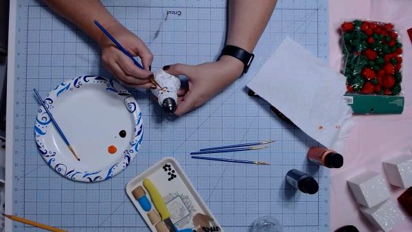 Painting face on Snowman Ornament - alifeofbalance.com
