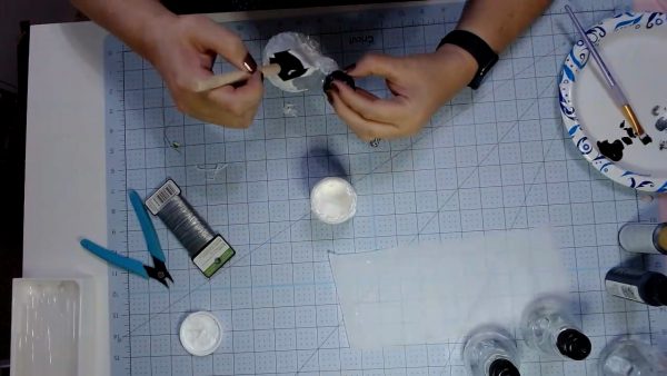 Painting snow on a Snowman Ornament - alifeofbalance.com